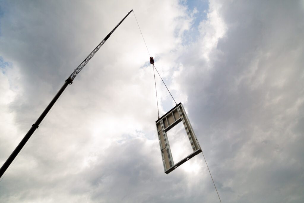 Ha Leo crane lifting frame at job site